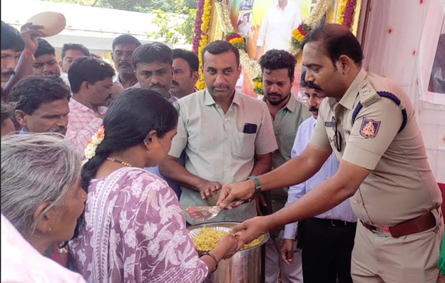 Floral tribute and breakfast distribution in memory of Puneeth Rajkumar