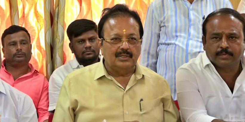 Minister defends school work video amid outrage