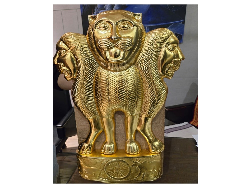Assam CM receives National Emblem memento
