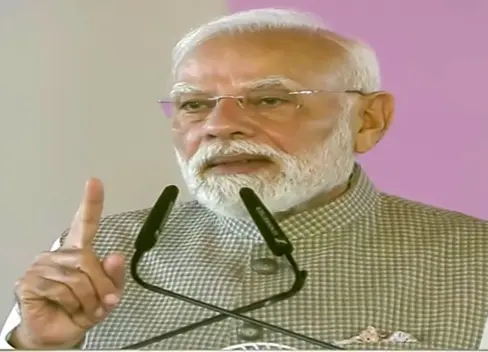 PM Modi criticizes past governments, inaugurates NMIA, Metro, and youth initiatives