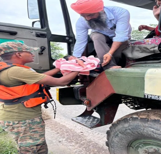 Army rescues thousands from flood-hit north India